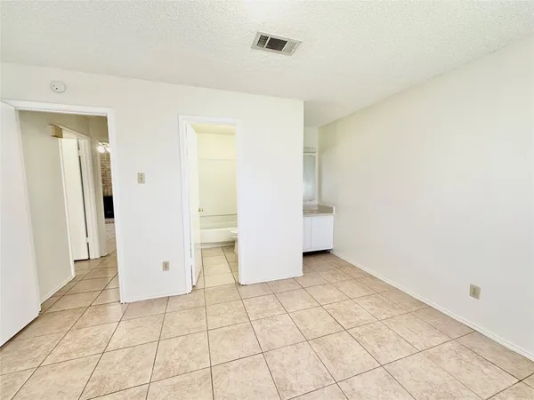 a bathroom with a sink a toilet and bathtub