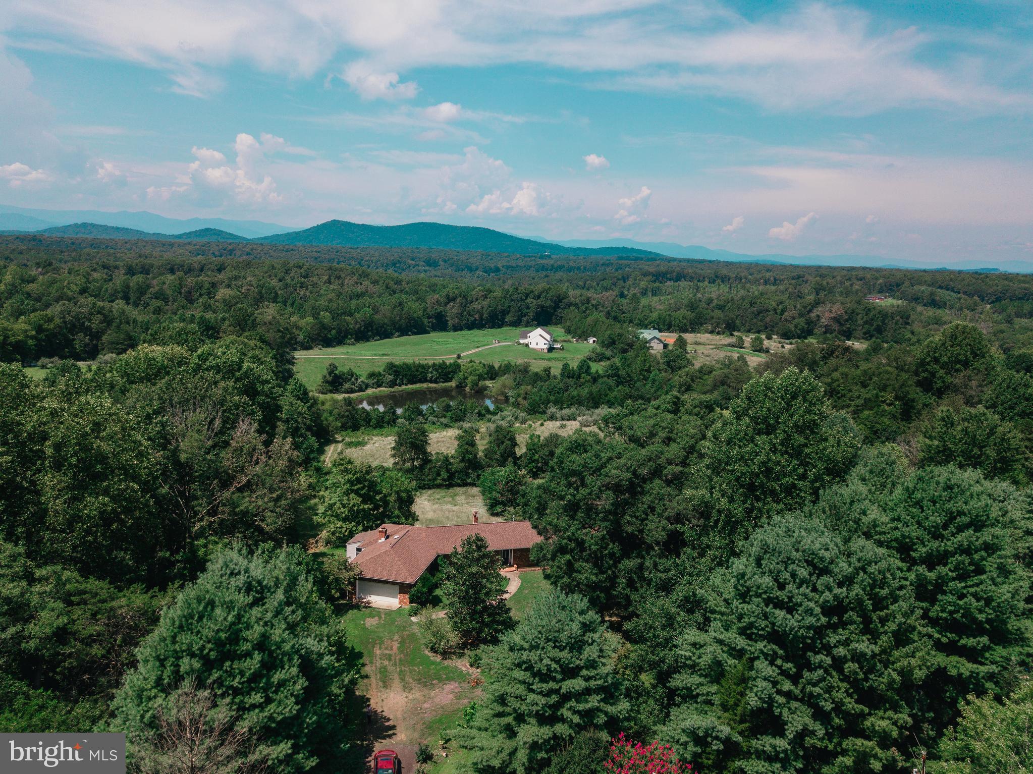 23562 Cedar Ridge Road Rapidan, VA 22733 - Photo 5 of 34 Drone shot looking over home and pond in the rear