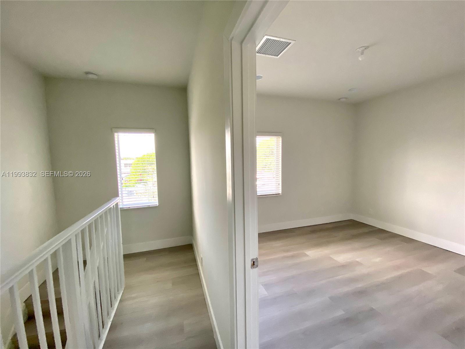 5860 Lincoln Street, Unit 5860 Hollywood, FL 33021 - Photo 11 of 21 a view of an empty room with a window