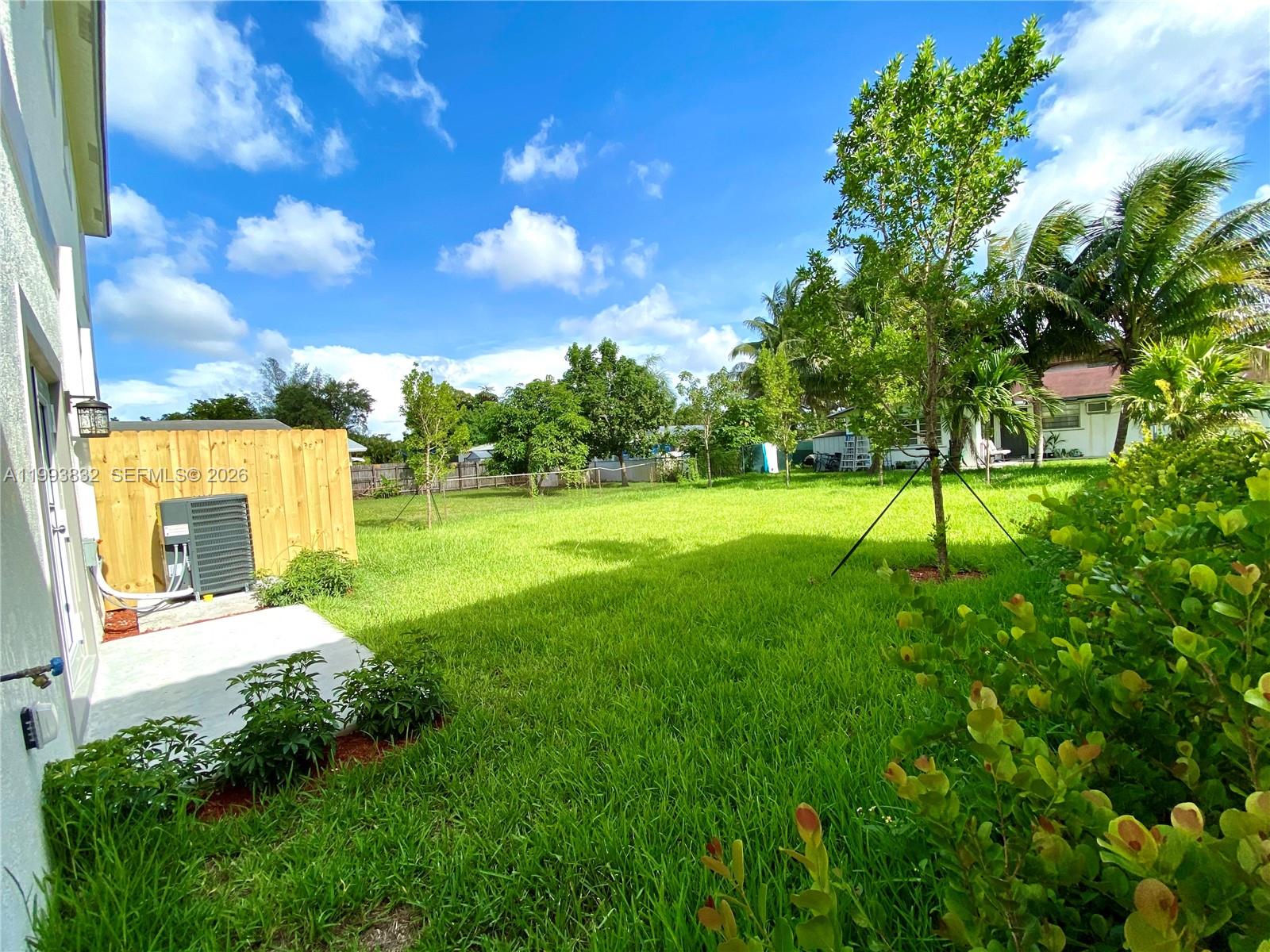 5860 Lincoln Street, Unit 5860 Hollywood, FL 33021 - Photo 20 of 21 a view of a park with a large tree