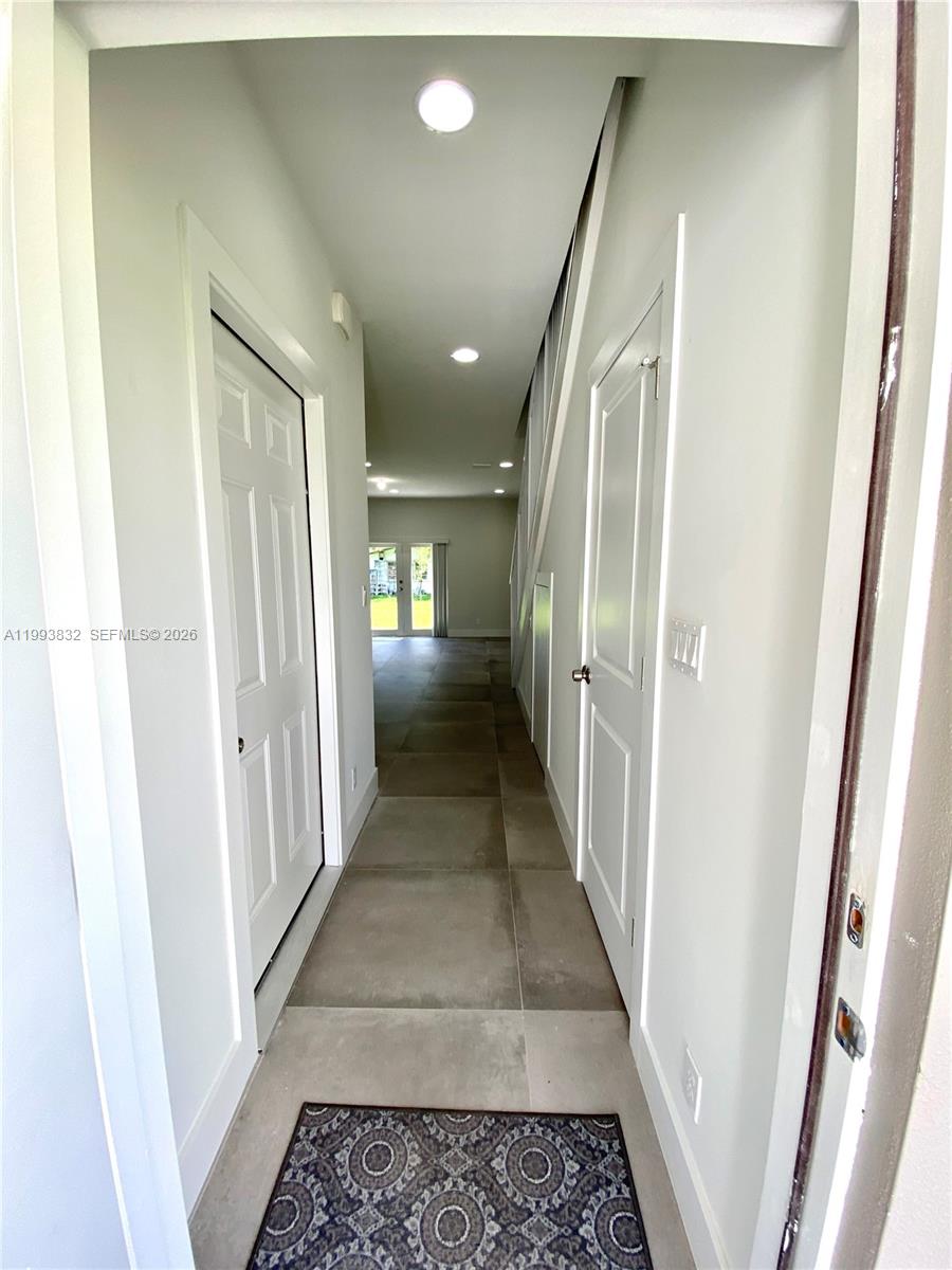 5860 Lincoln Street, Unit 5860 Hollywood, FL 33021 - Photo 5 of 21 a bathroom with a mirror