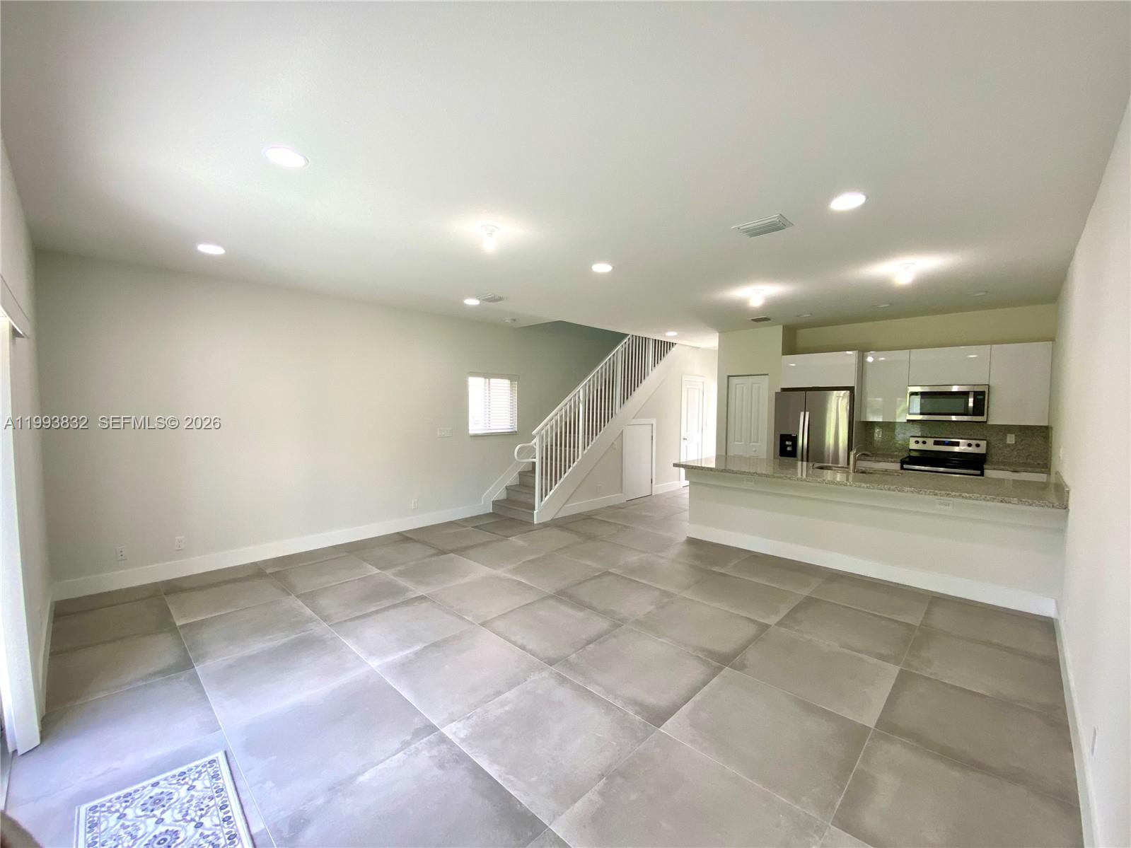 5860 Lincoln Street, Unit 5860 Hollywood, FL 33021 - Photo 7 of 21 a view of a electric appliances in a room
