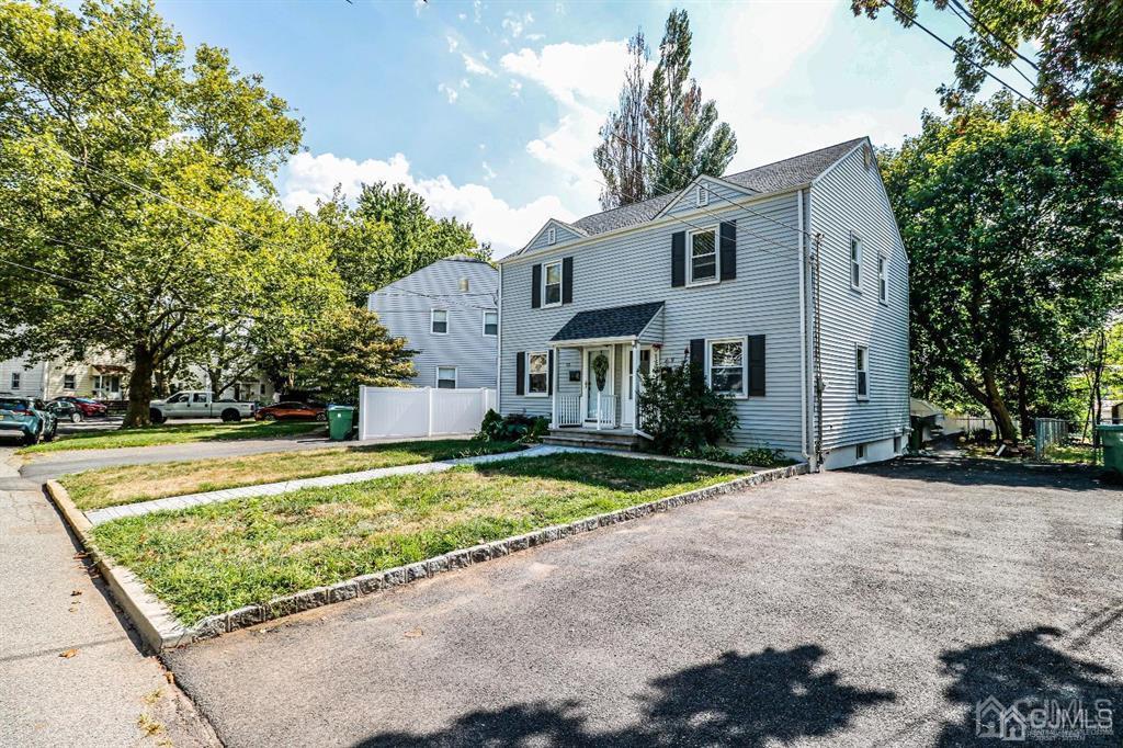 9 MacArthur Drive Edison, NJ 08837 - Photo 12 of 12 a front view of a house with a yard