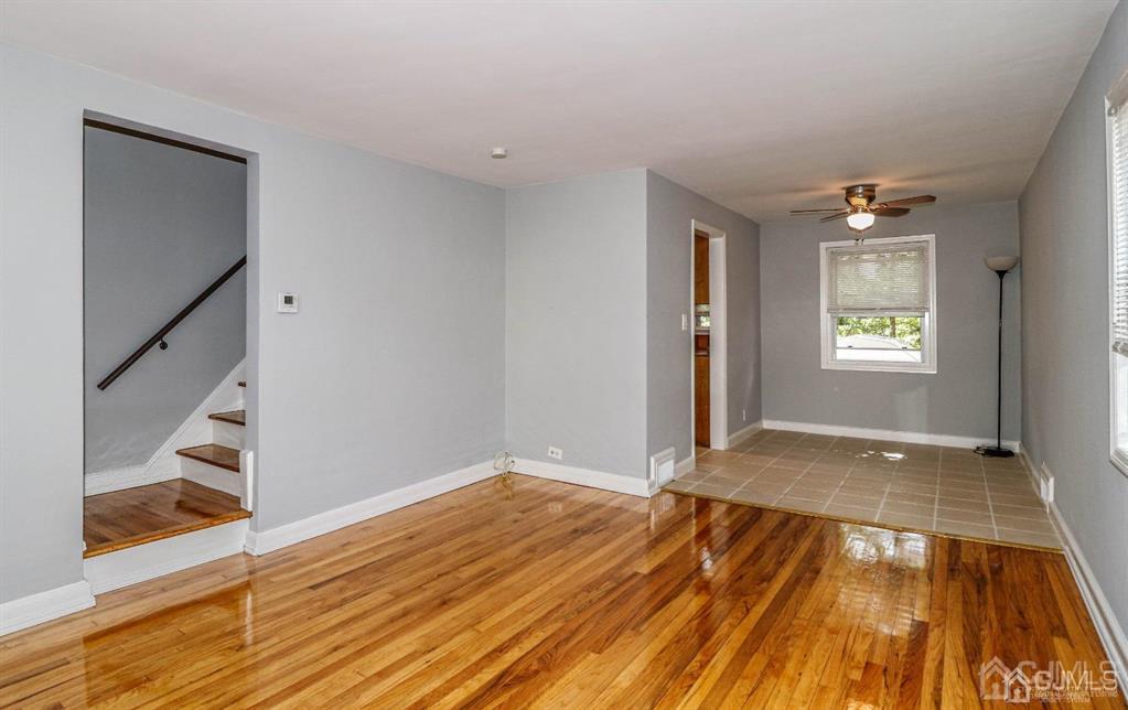 9 MacArthur Drive Edison, NJ 08837 - Photo 2 of 12 wooden floor in an empty room with a window