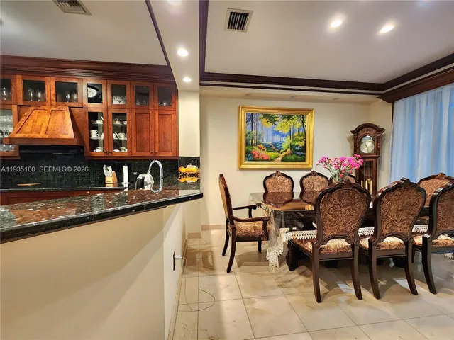 a view of a dining room with furniture