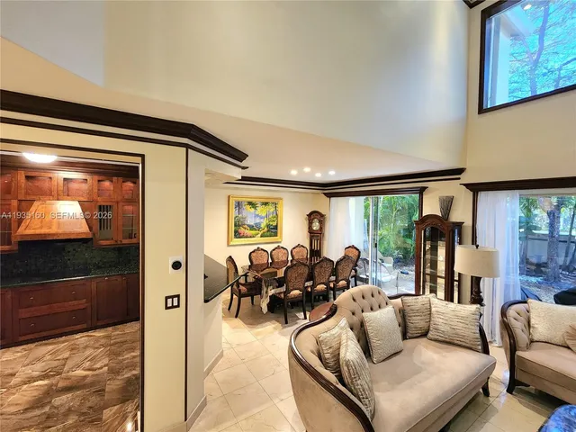 a view of entryway with stairs and wooden floor