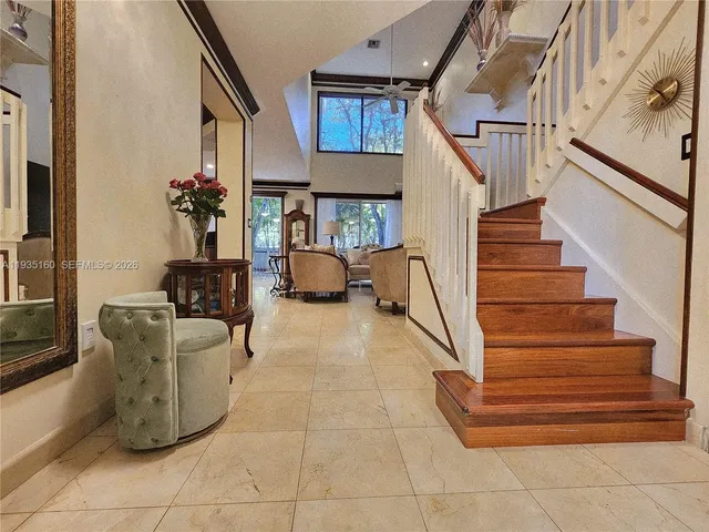 a view of a livingroom with a washer and dryer