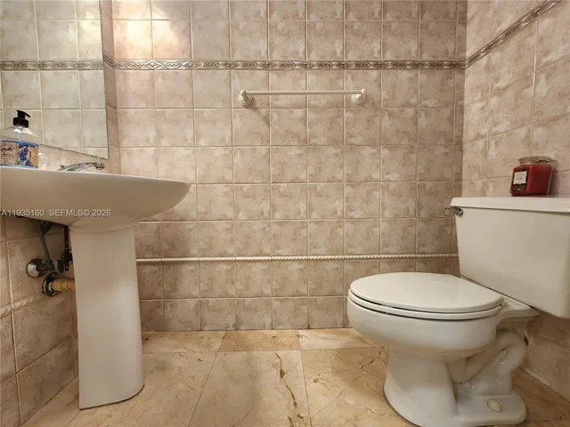 a view of a building with a sitting area