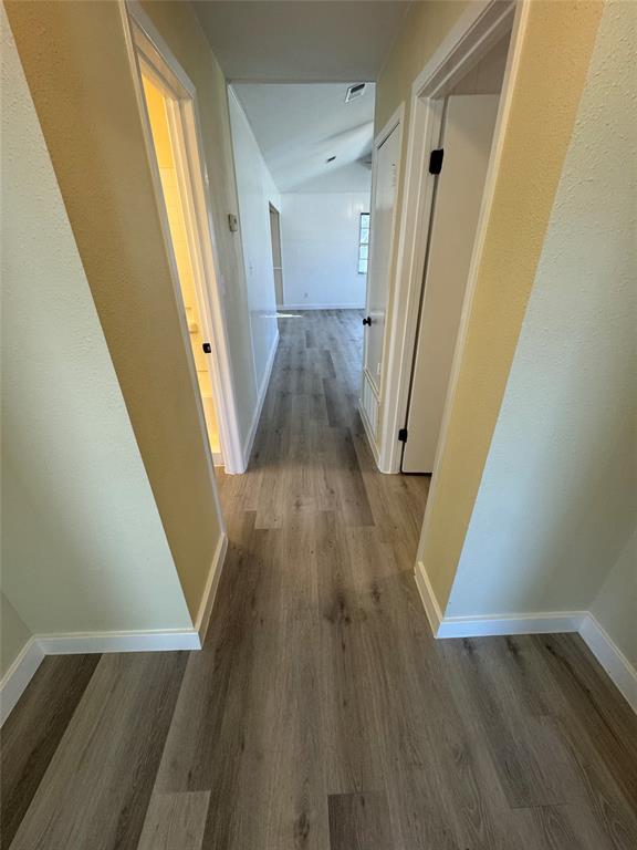 116 Lusk Street Bailey, TX 75452 - Photo 13 of 19 a view of a hallway view with wooden floor and staircase
