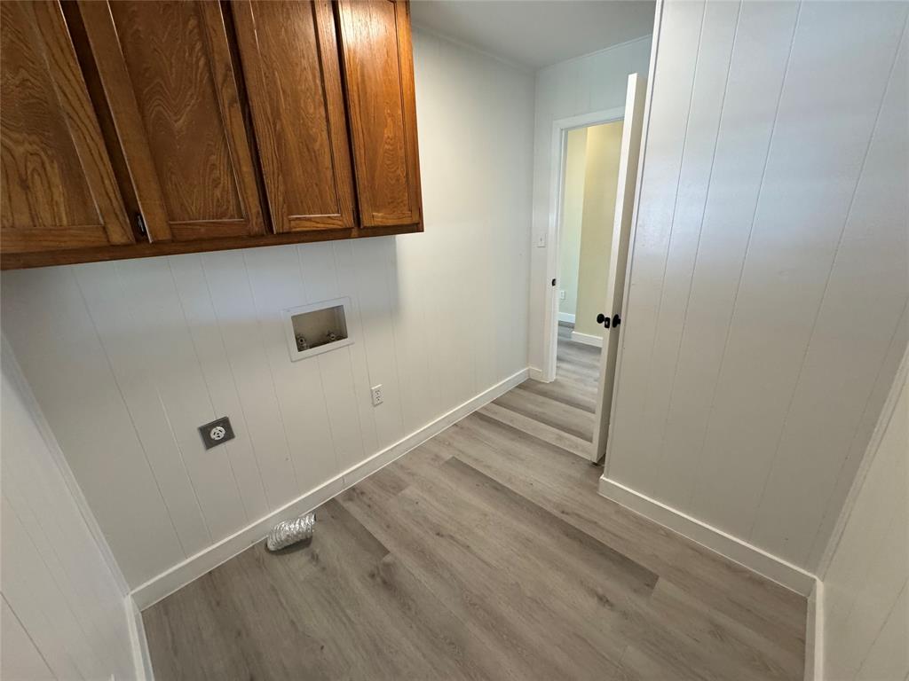 116 Lusk Street Bailey, TX 75452 - Photo 16 of 19 a view of storage and utility room with wooden floor