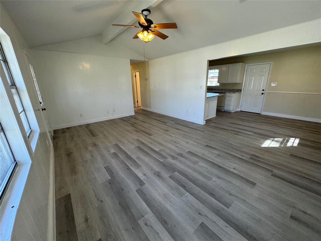 116 Lusk Street Bailey, TX 75452 - Photo 5 of 19 wooden floor in an empty room with a window