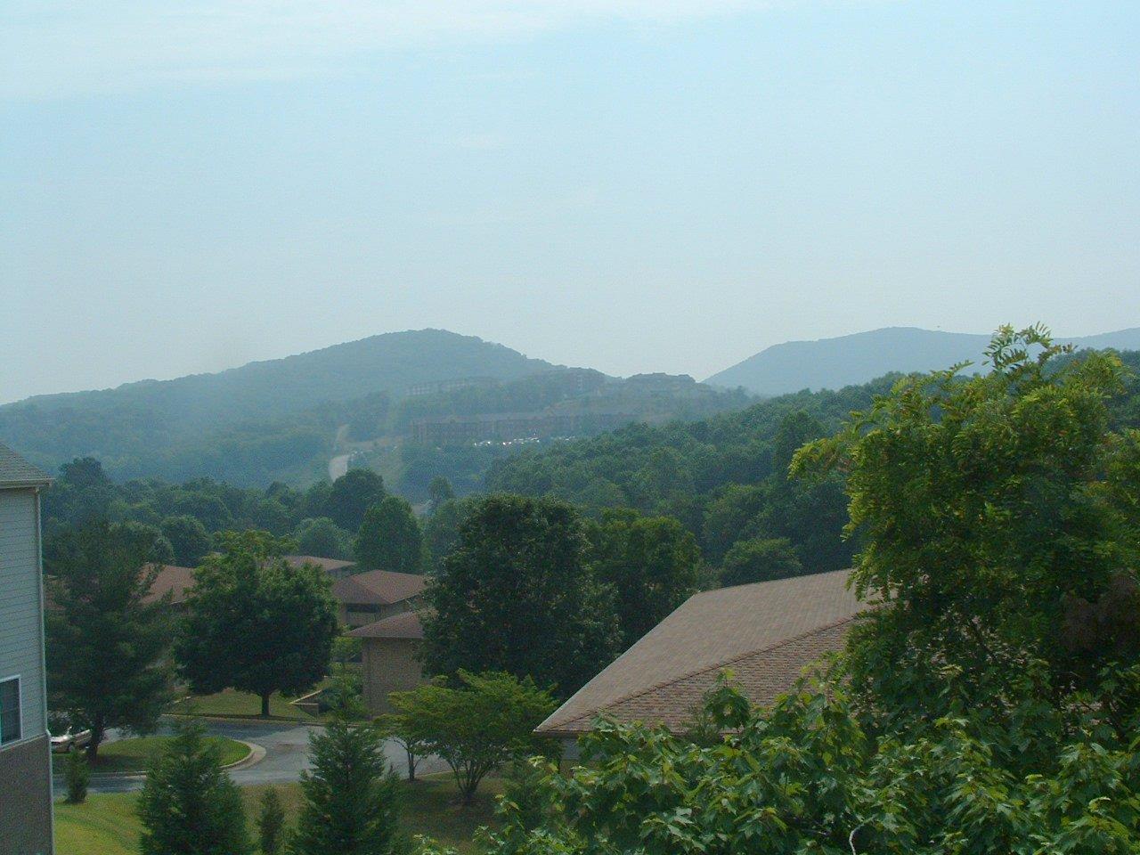 5428 Quail Ridge Circle Roanoke, VA 24018 - Photo 3 of 4 an aerial view of residential house with outdoor space and trees all around