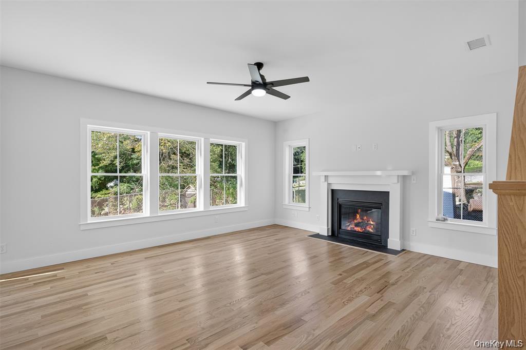 Tbd Kirbytown Road Middletown, NY 10940 - Photo 14 of 35 a view of empty room with wooden floor fireplace and a window