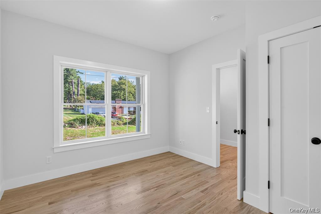 Tbd Kirbytown Road Middletown, NY 10940 - Photo 22 of 35 a view of an empty room with wooden floor and a window