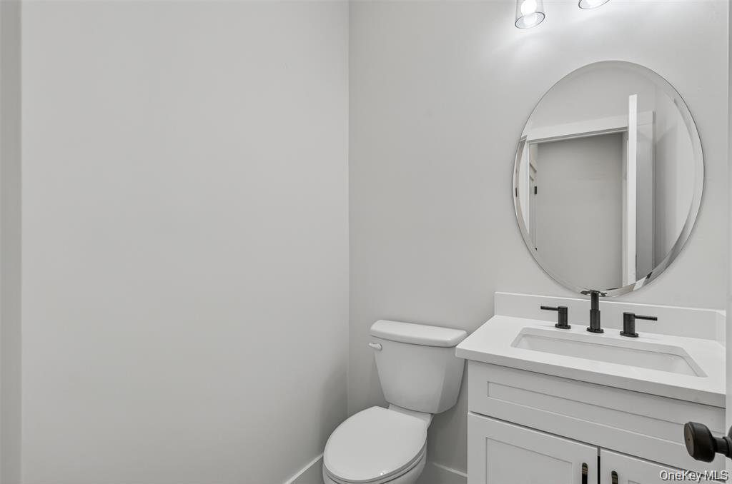 Tbd Kirbytown Road Middletown, NY 10940 - Photo 23 of 35 a bathroom with a toilet a sink and mirror
