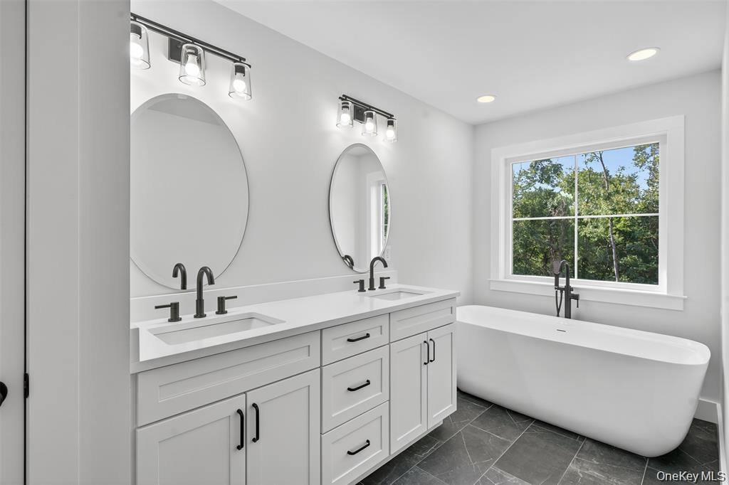 Tbd Kirbytown Road Middletown, NY 10940 - Photo 26 of 35 a bathroom with a double vanity sink and mirror with window