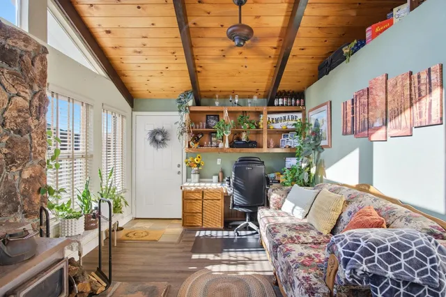 a view of a chairs and table in a patio