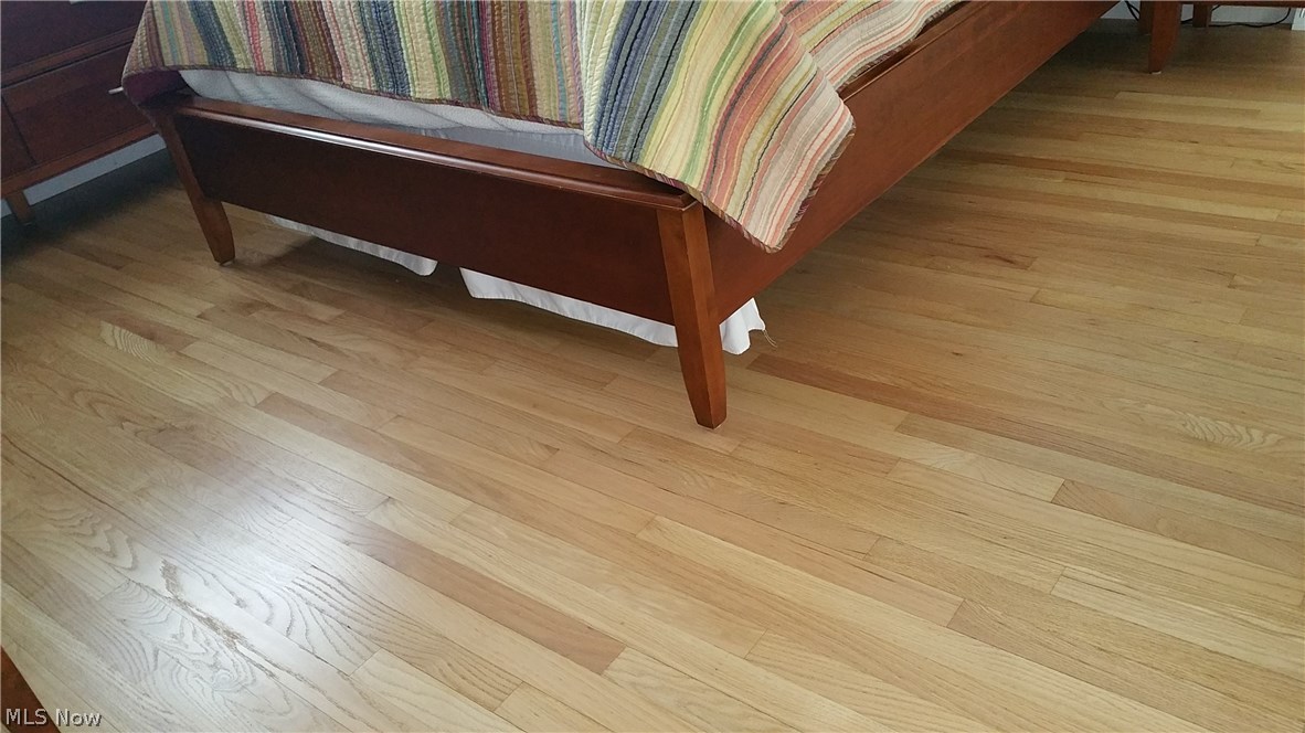 9448 Avery Road Broadview Heights, OH 44147 - Photo 21 of 32 Refinished, repaired and replaced Harwood Flooring in all three Bedrooms, Living room and Dining Room