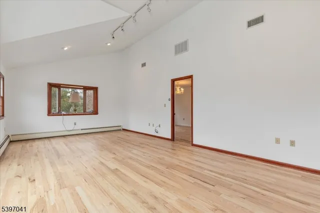 an empty room with windows