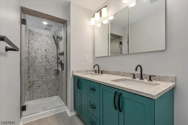 a view of a livingroom with an empty space and a fireplace