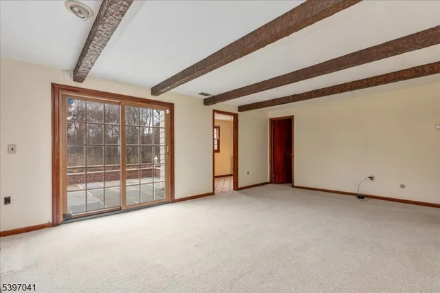 a kitchen with a cabinets and window