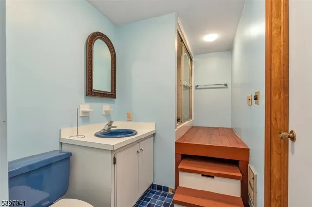 a view of a balcony with furniture