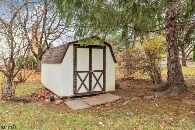 a front view of a building with garden
