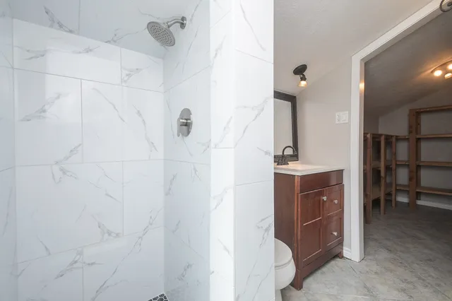 a bathroom with a bathtub and a sink