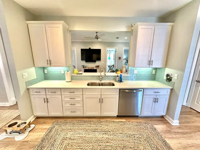 a bedroom with a bed and flat screen tv