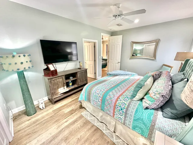 a bathroom with a sink vanity and a mirror