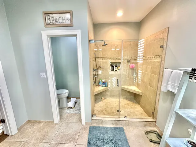 a utility room with a sink dryer and washer