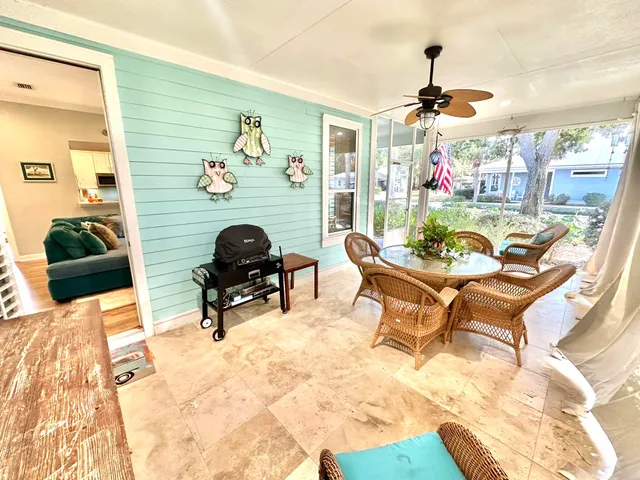 a view of a house with a swimming pool and a yard