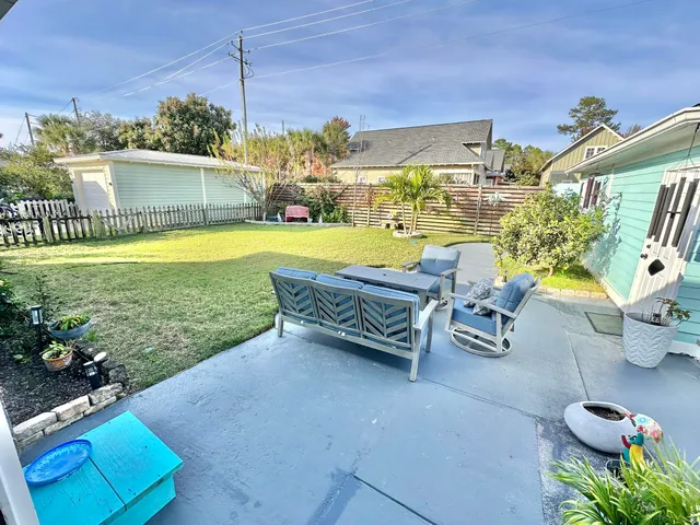 a front view of a house with a yard and porch