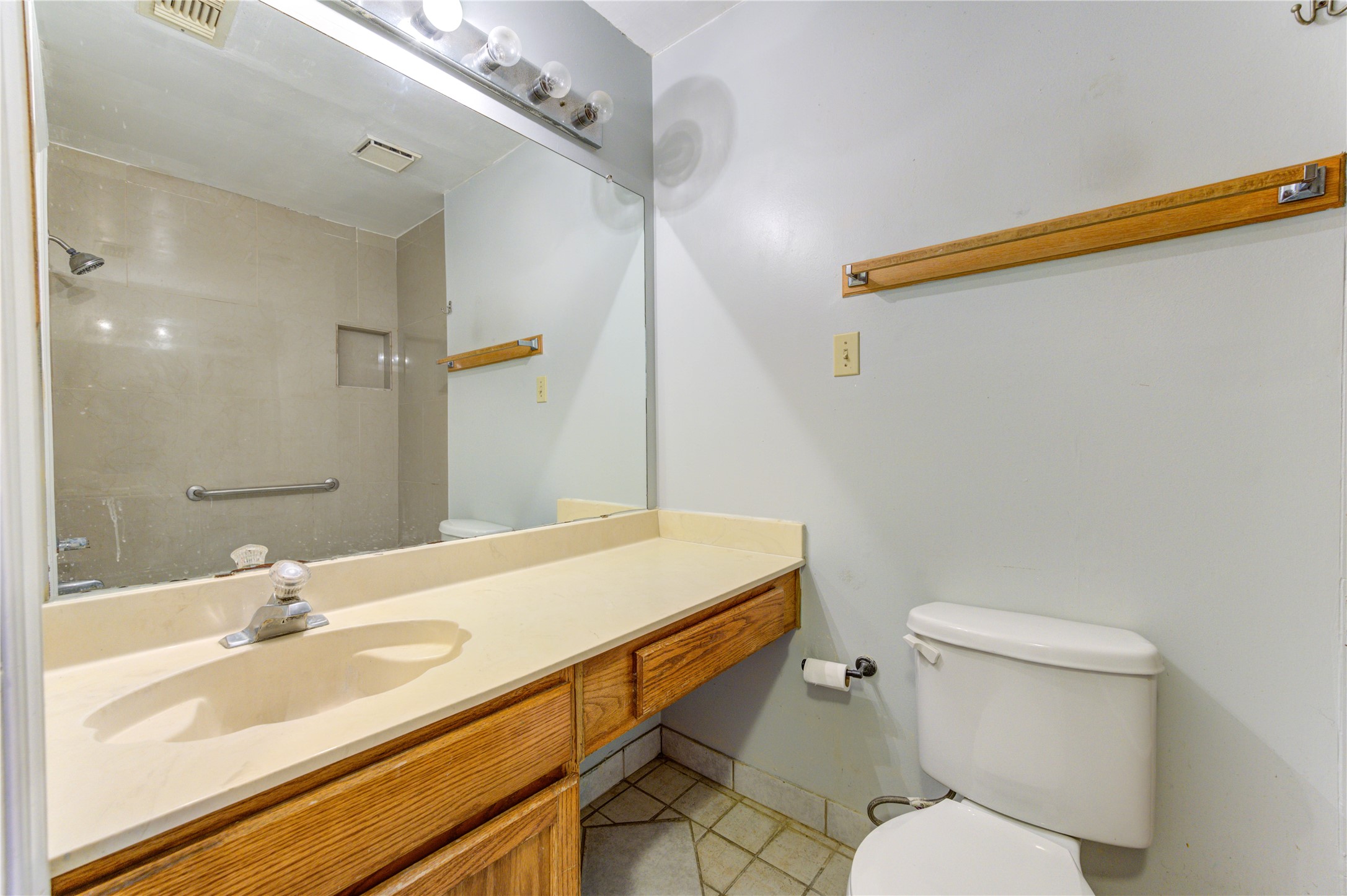 19927 Ricewood Way Katy, TX 77449 - Photo 18 of 23 a bathroom with a sink a toilet and shower