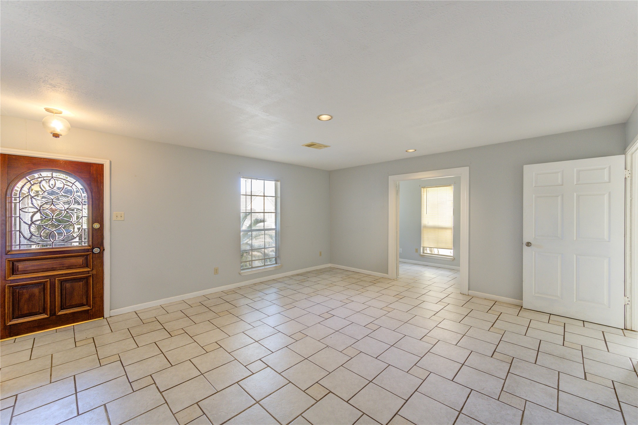 19927 Ricewood Way Katy, TX 77449 - Photo 2 of 23 a view of an empty room and window