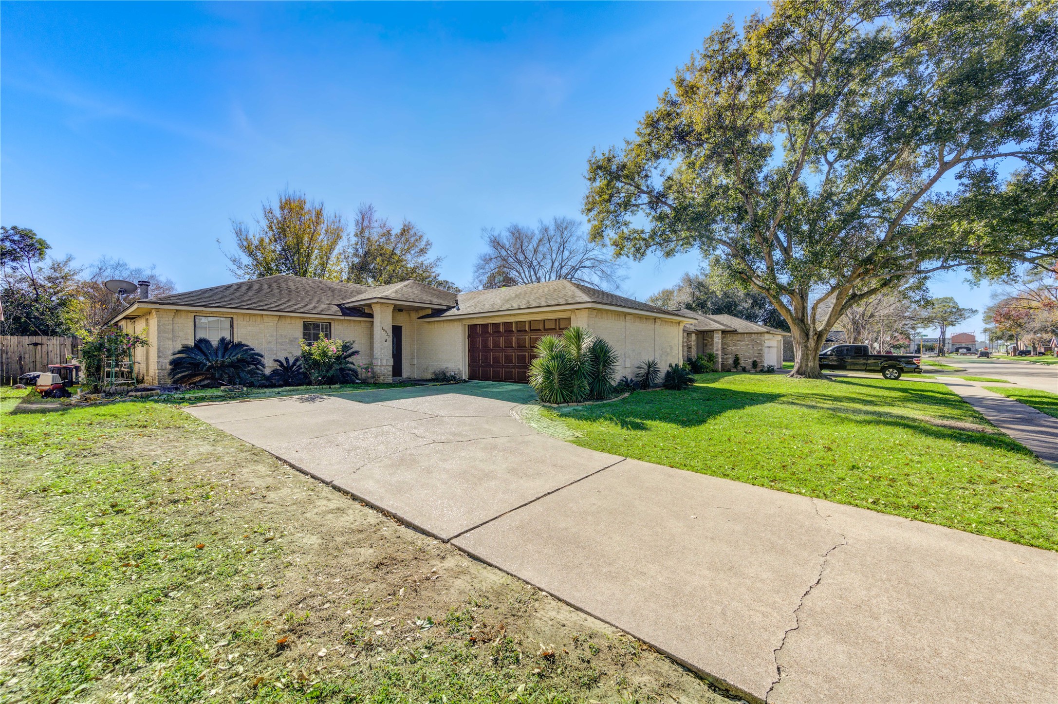 19927 Ricewood Way Katy, TX 77449 - Photo 22 of 23 a front view of a house with a yard