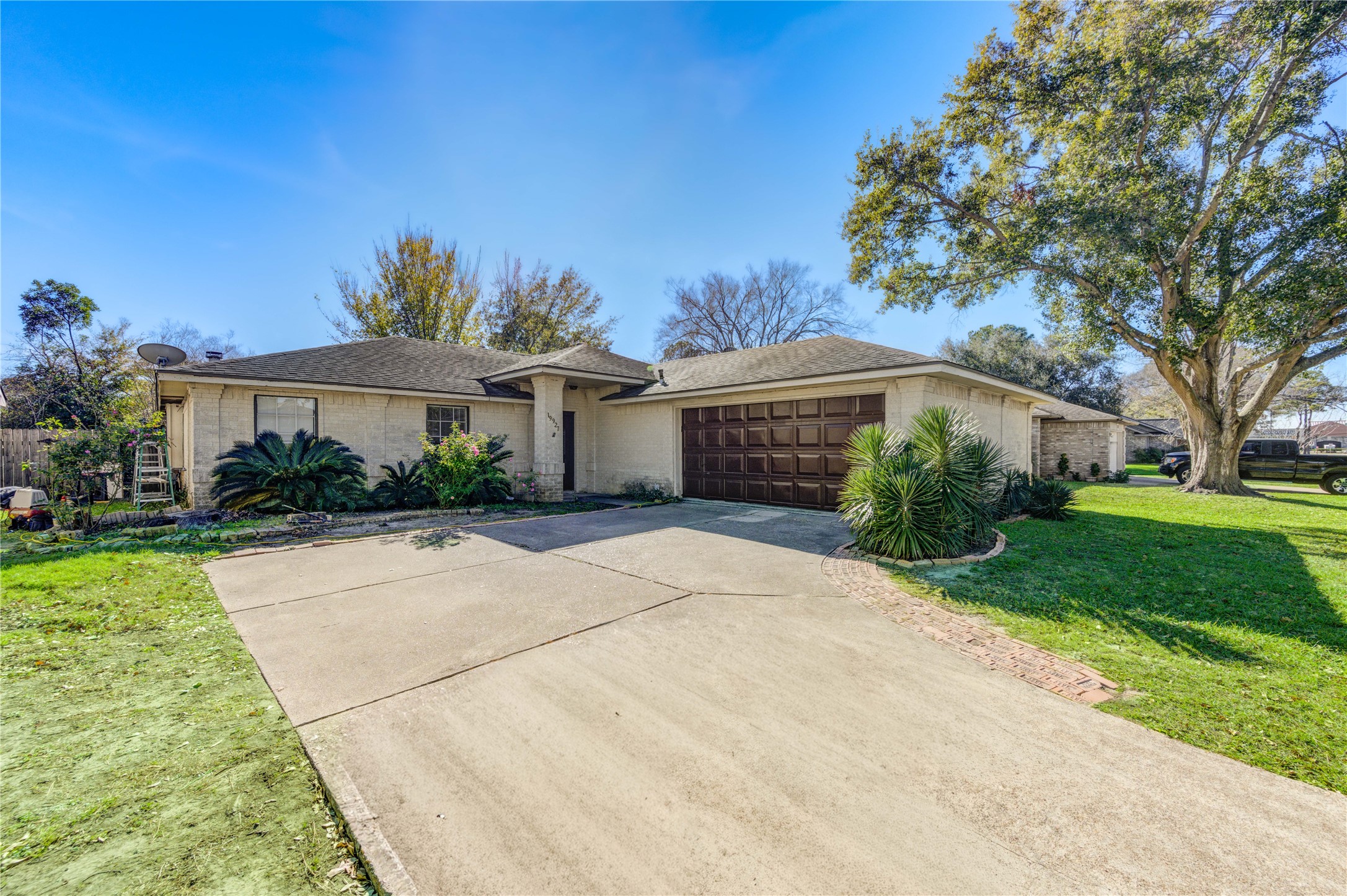 19927 Ricewood Way Katy, TX 77449 - Photo 23 of 23 a front view of a house with a yard