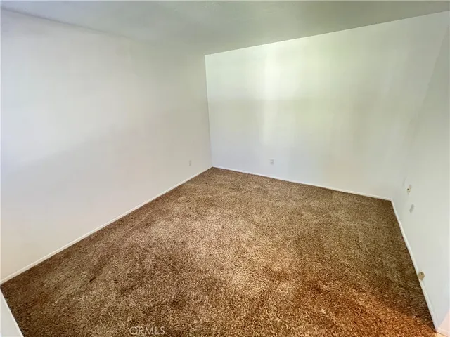 a bathroom with a shower and a toilet