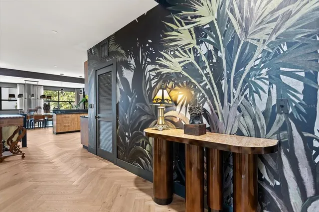 a view of entryway with a grandfather clock and a bookshelf