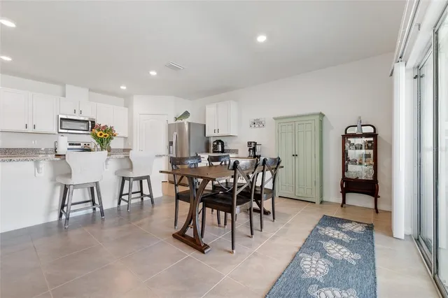 a view of a dining room with furniture