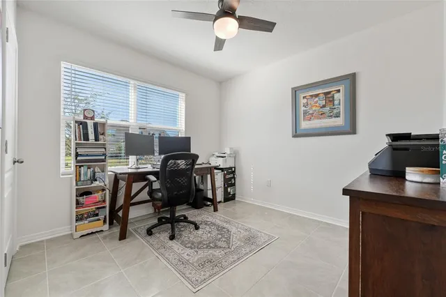 a view of a workspace with furniture