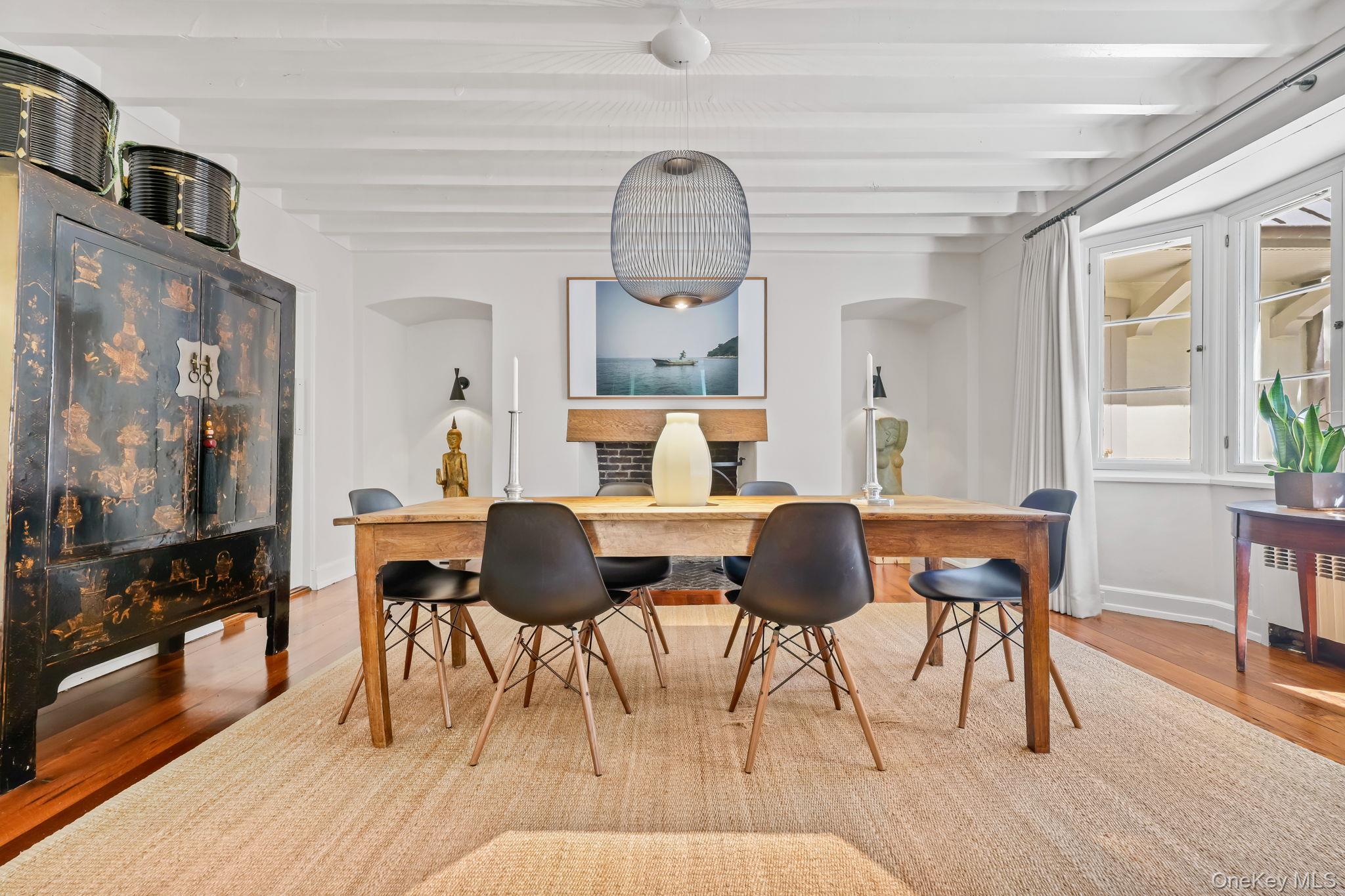 4 High Road Bronxville, NY 10708 - Photo 12 of 32 a view of a dining room with furniture and wooden floor