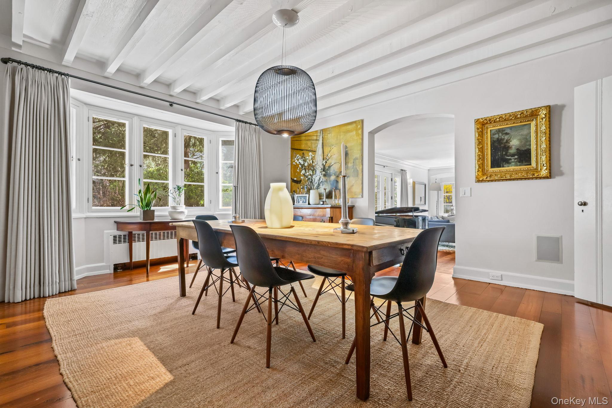 4 High Road Bronxville, NY 10708 - Photo 14 of 32 a view of a dining room with furniture window and wooden floor