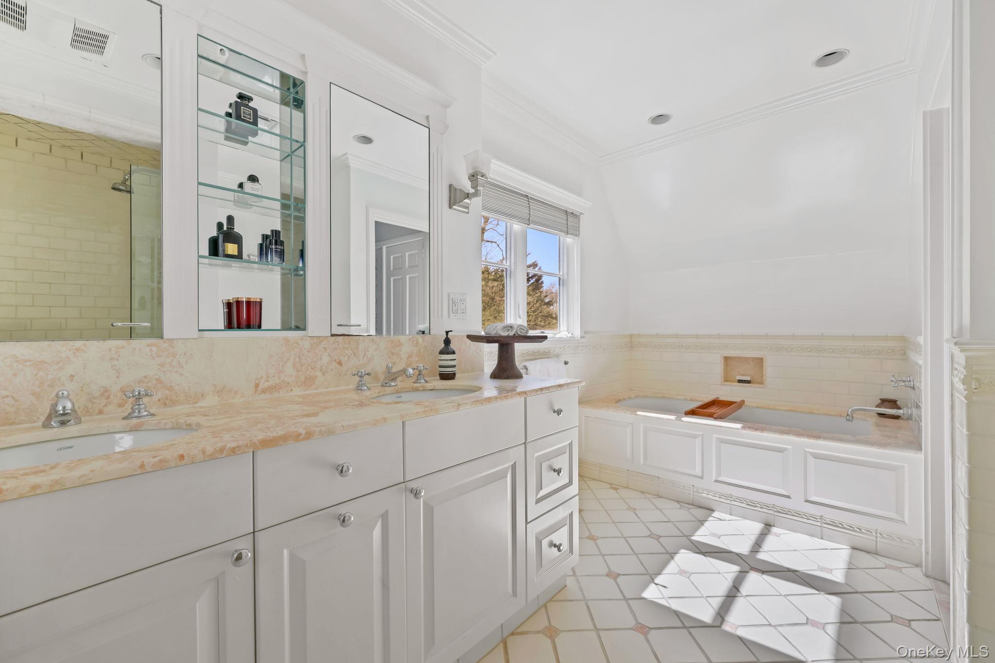 4 High Road Bronxville, NY 10708 - Photo 22 of 32 a bathroom with a sink a toilet and a mirror