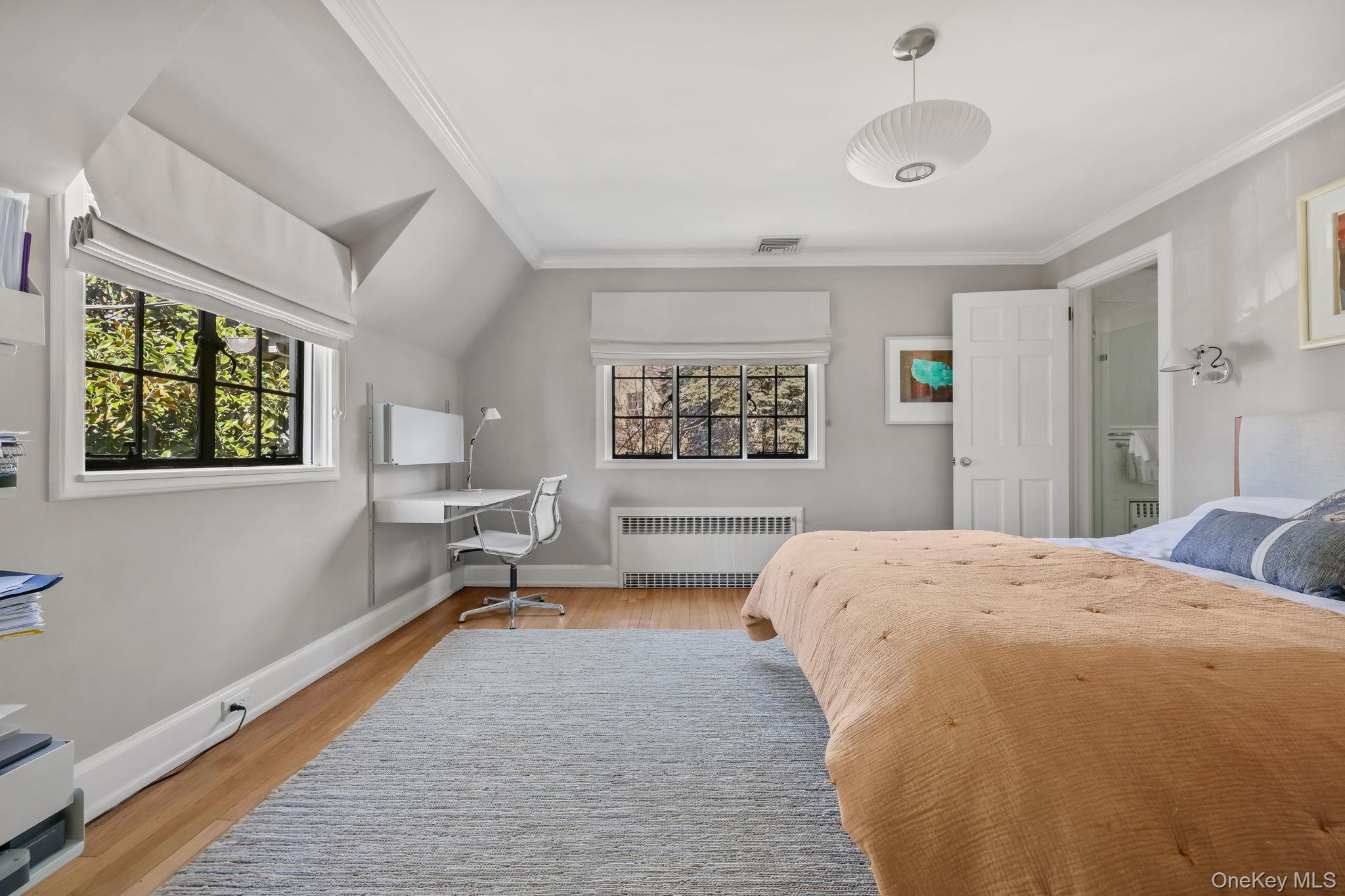 4 High Road Bronxville, NY 10708 - Photo 24 of 32 a bedroom with a bed and a window