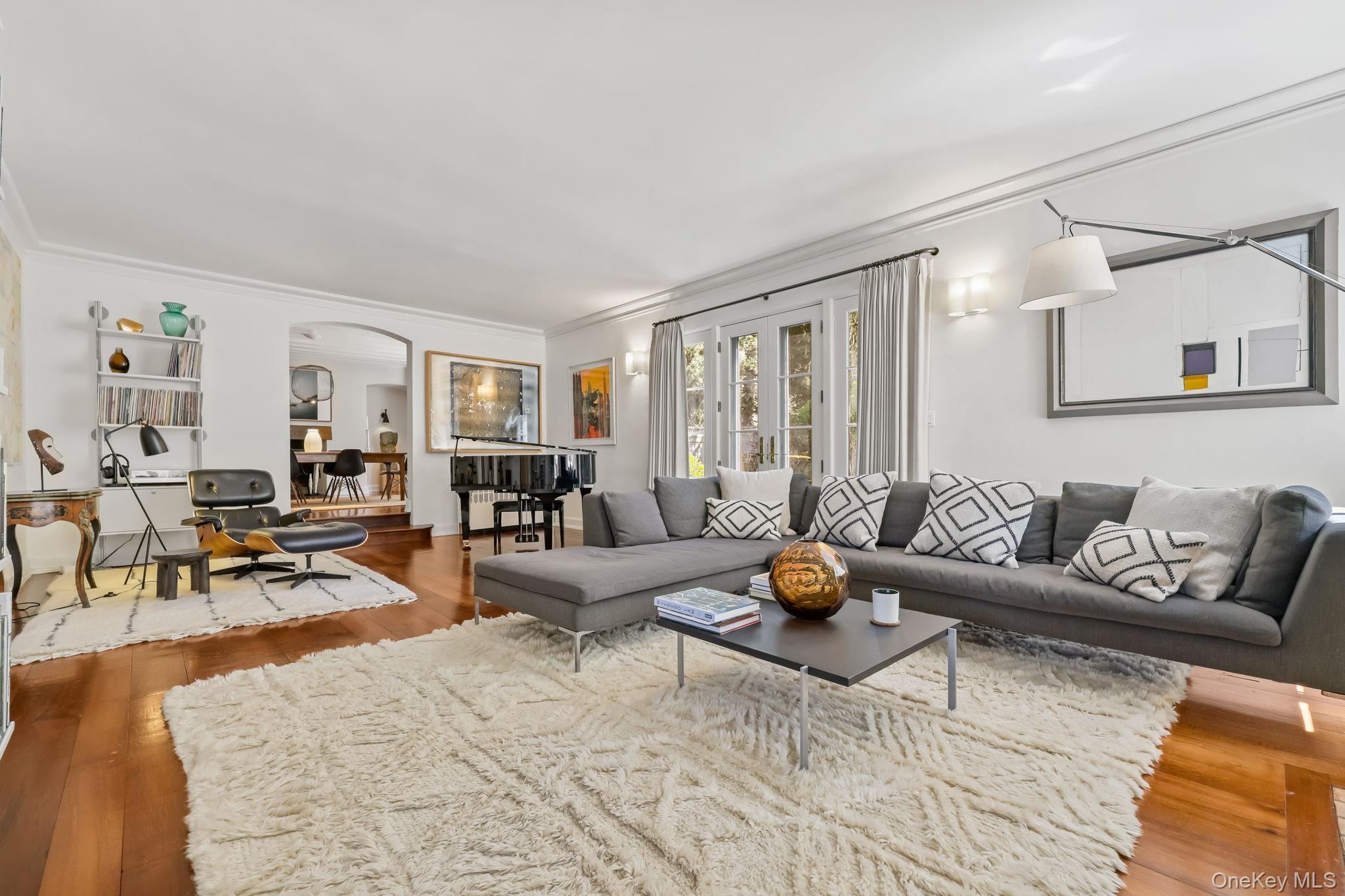 4 High Road Bronxville, NY 10708 - Photo 9 of 32 a living room with furniture a rug and a window