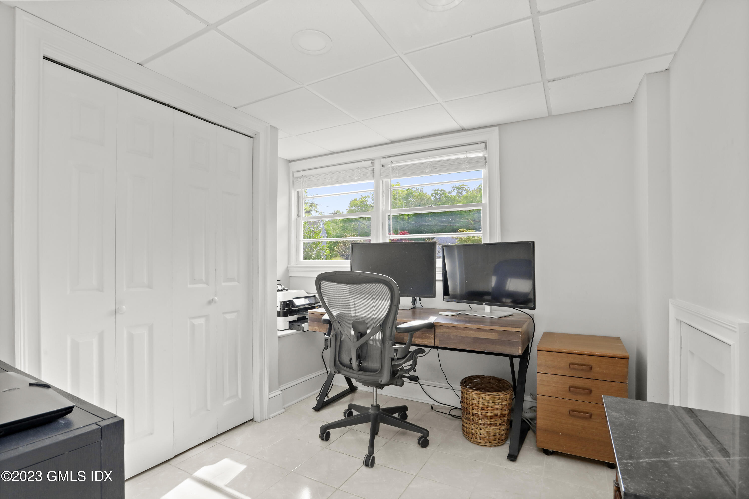 17 Fado Lane Cos Cob, CT 06807 - Photo 11 of 16 a view of a workspace with furniture and a window