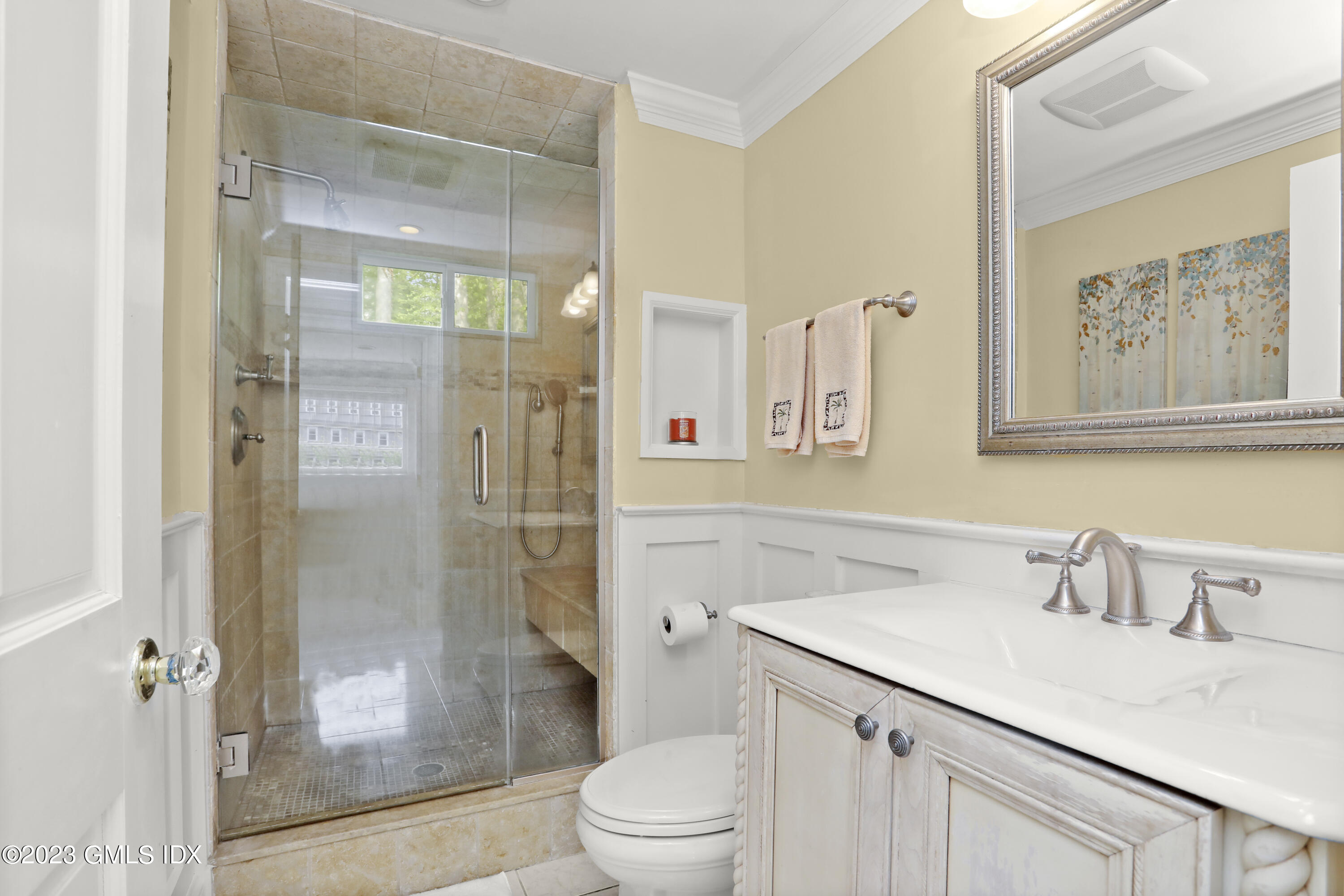 17 Fado Lane Cos Cob, CT 06807 - Photo 12 of 16 a bathroom with a sink a toilet and shower