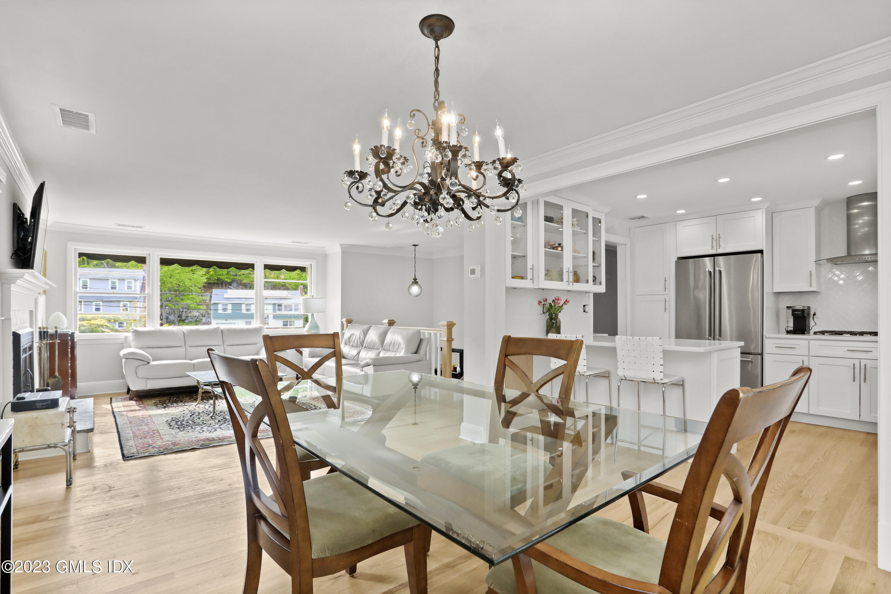17 Fado Lane Cos Cob, CT 06807 - Photo 5 of 16 a view of a dining room with furniture window and outside view