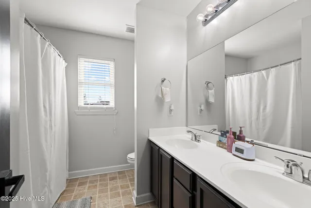 $303,000 | 135 Rosemary Avenue, Hubert, NC 28539